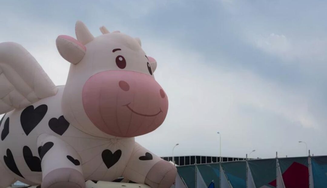 Branded inflatable display at event drawing crowd attention